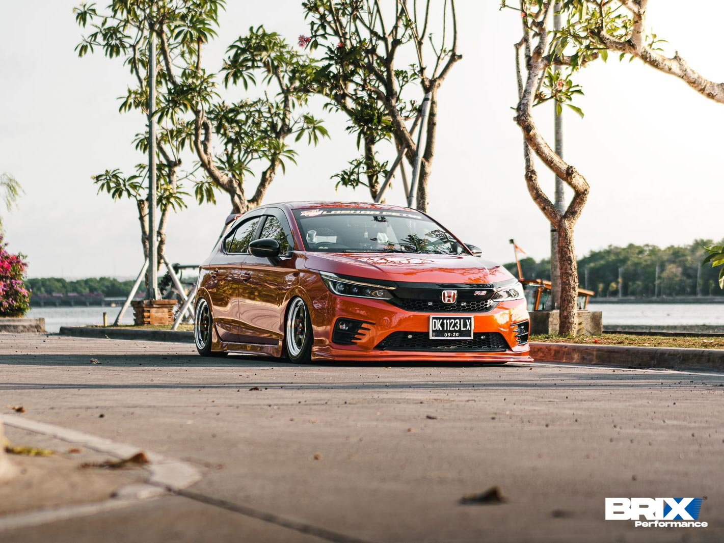 Honda City Hatchback with BRIX Performance Competition Series, featured in show car stance at waterfront.