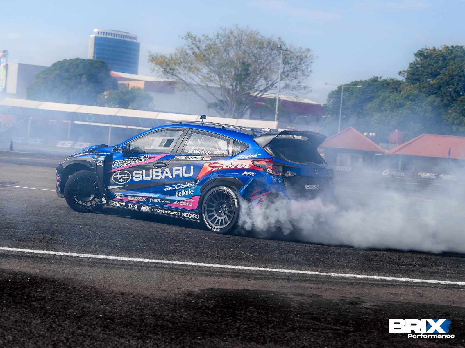 Side profile of drifting Subaru Crosstrek at Southeast Asia Drift Series showing aggressive angle.