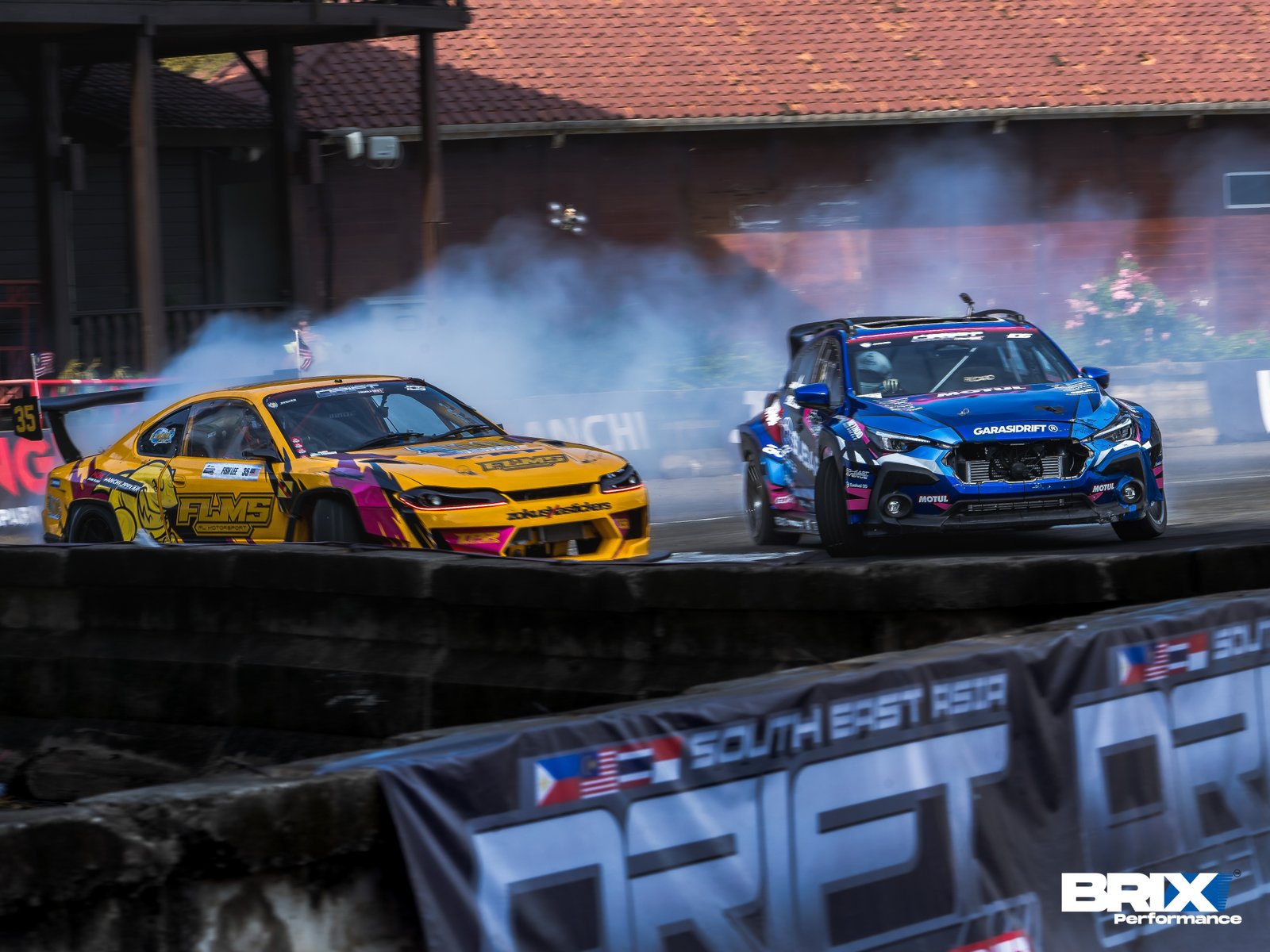 Subaru Crosstrek and yellow S15 Silvia in close tandem run at Southeast Asia Drift Series.