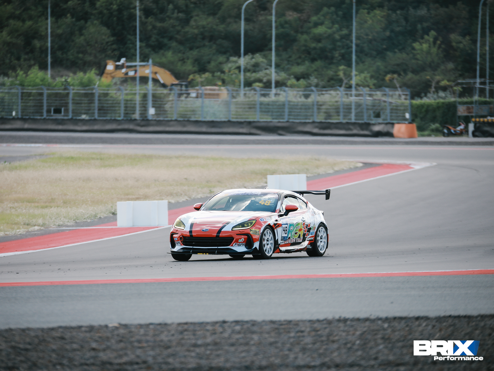 Subaru BRZ approaching a corner at Mandalika International Street Circuit.